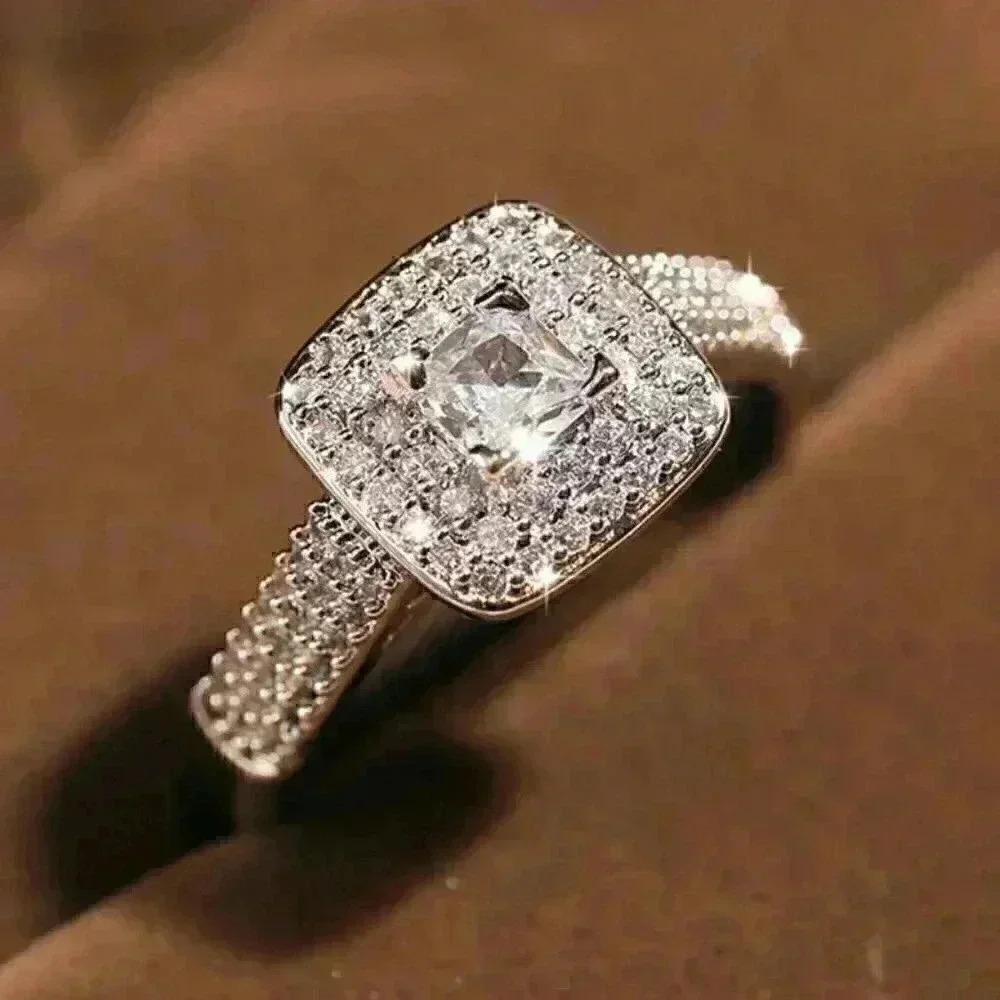 New 925 Silver Sim. Diamonds Ring